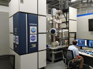 Tom Zega at the control panel of the 12-foot tall transmission electron microscope at the Kuiper Materials Imaging and Characterization Facility at the UA's Lunar and Planetary Lab. The instrument allows researchers to see individual atoms in extraterrest Tom Zega at the control panel of the 12-foot tall transmission electron microscope at the Kuiper Materials Imaging and Characterization Facility at the UA's Lunar and Planetary Lab. The instrument allows researchers to see individual atoms in extraterrest
